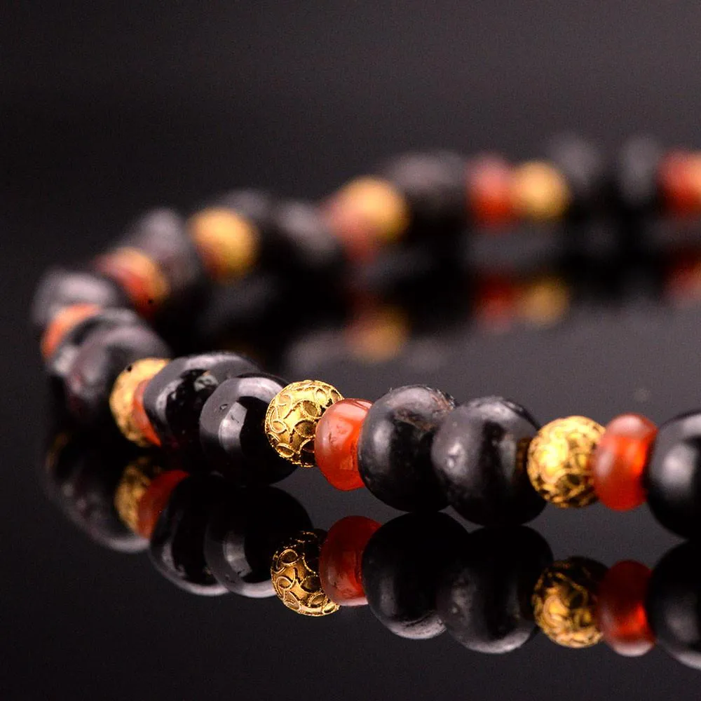 A Near Eastern Garnet and Carnelian Bead Necklace, ca. 1st millennium BCE