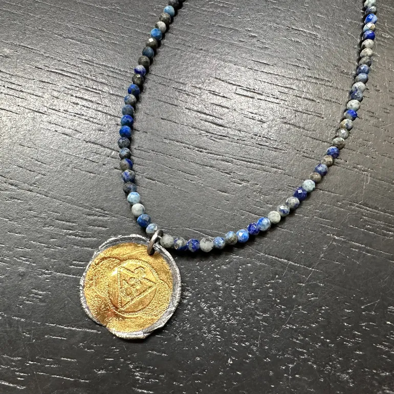 Chakra Kahn: Gold and Silver Chakra Necklace on Full Crystal Strand