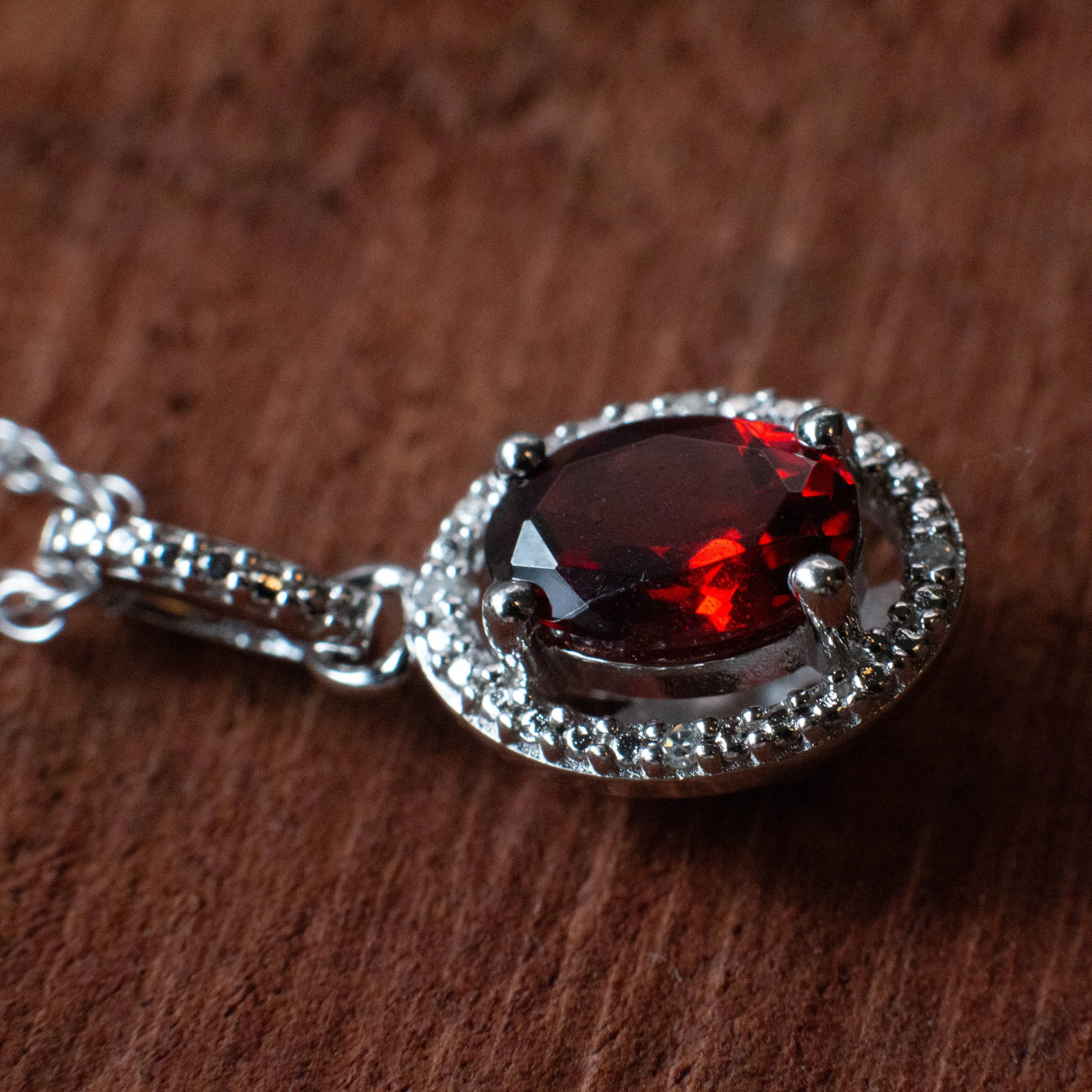 Confidence and Strength: Garnet and Diamond Halo Style Necklace