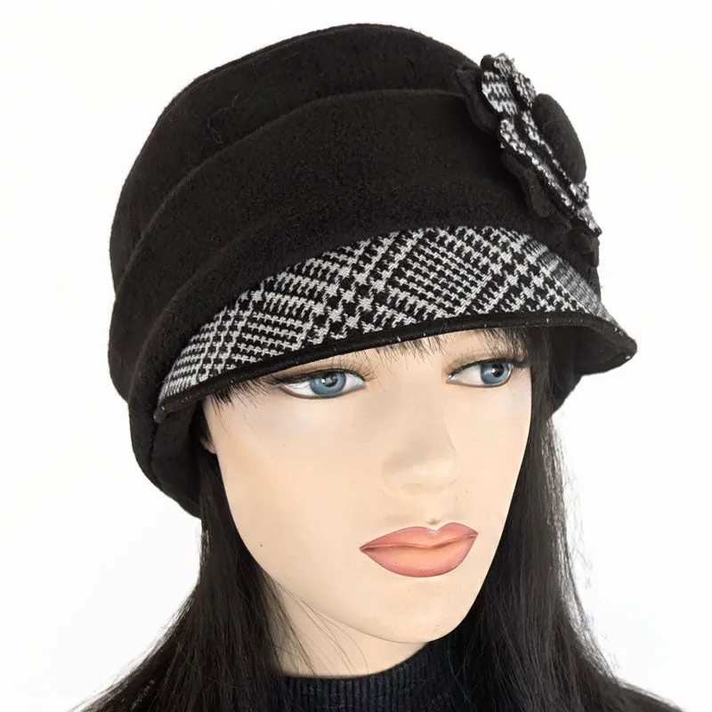 Fleece Fashion Cap with floral pin in black fleece with woolen plaid trim