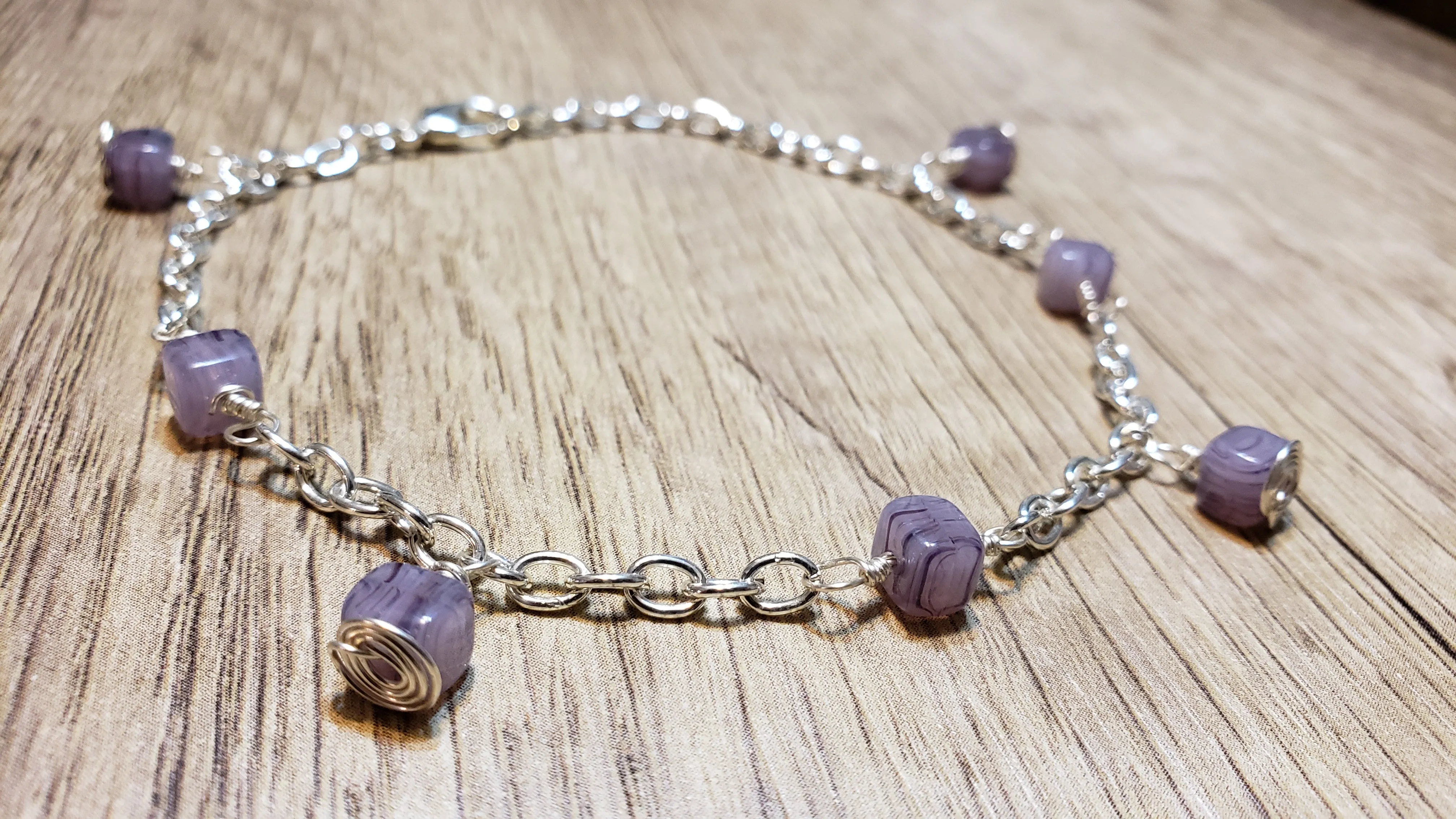 Hand Crafted Purple Czech Glass & Non Tarnish Silver Tone Chain Anklet with Dangle Accents. Adjustable up to 10" with Lobster Claw Clasp.